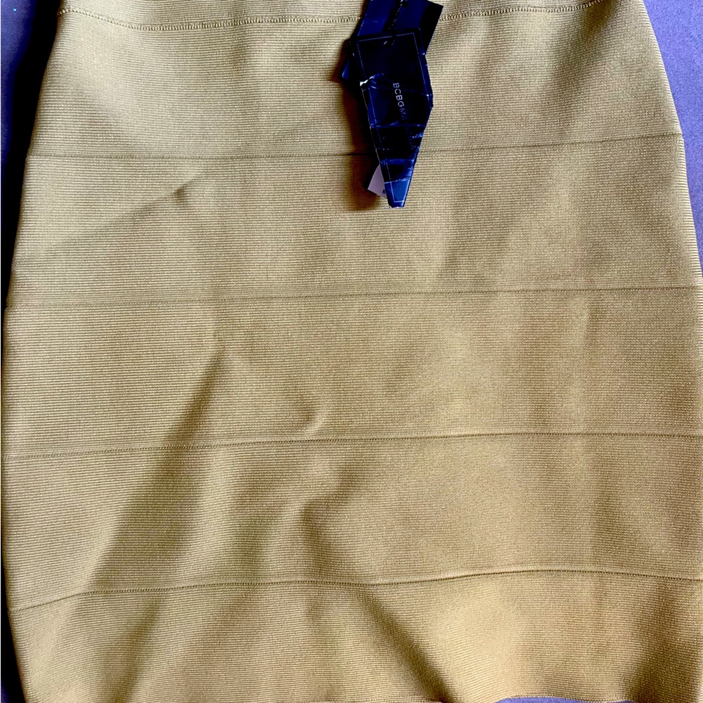 Bandage mustard color skirt authentic bcbg. Brand new with tags.never been worn